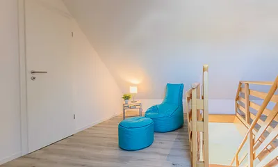 erstes Schlafzimmer mit Sitzsack zum Entspannen
