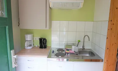 Pantryküche mit Kühlschrank u 2 Kochplatten