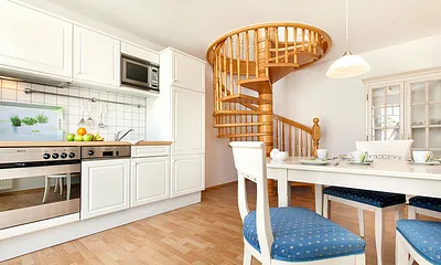 Hier im Bild die Wendeltreppe zum Wohnzimmer.