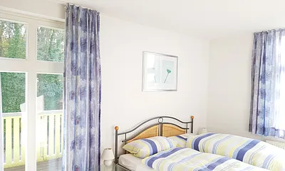 Schlafzimmer mit eigenem Balkon