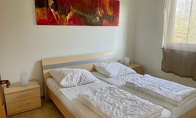 Schlafzimmer mit Doppelbett