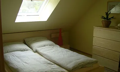 Schlafzimmer mit Doppelbett