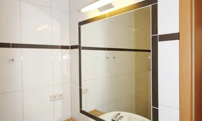 Bad mit ebenerdiger Dusche inneliegend