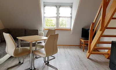 Wohnbereich mit Schlafcouch 