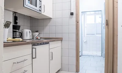 Villa See-Eck FeWo Erdgeschoss - Küchenzeile