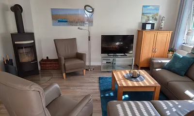 Ferienwohnung Sonnenstern - zentral und strandnah, 3-Zimmer-Ferienwohnung (Erdgeschoss, Kamin)