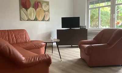 Wohnbereich mit Coutch,  TV und Radio  