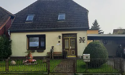 Ferienhaus Neumann mit überdachtem Parkplatz -  Carport