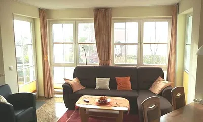 Wohnzimmer mit Ausziehcouch