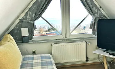 Lesezimmer mit Meerblick im DG (auch als 5.+6. Schlafmöglichkeit nutzbar)