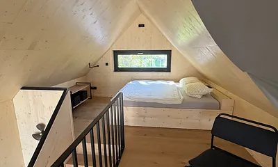 Galerie mit Doppelbett 