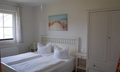 Schlafzimmer mit Doppelbett