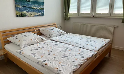 Schlafzimmer (200x200cm Doppelbett)