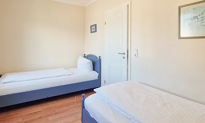 Schlafzimmer mit 2 Einzelbetten