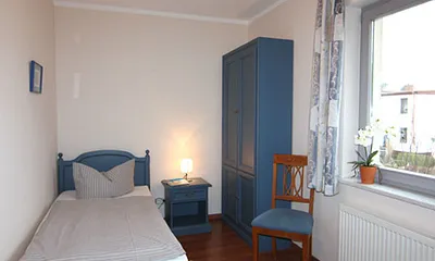 2 Schlafzimmer mit 2 Einzelbetten