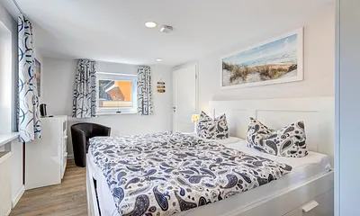 Schlafzimmer 1 mit Doppelbett