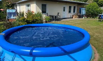 FeWo Außenansicht mit Pool