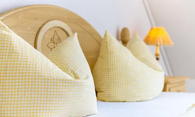 Ferienhaus Residenz zu den 3 Tannen Zingst - Schlafzimmer mit Doppelbett