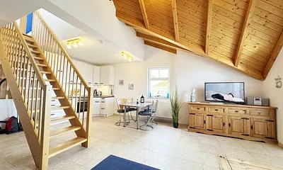 Wohnbereich mit Treppe nach oben