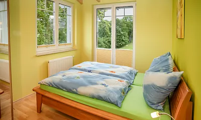 Schlafzimmer 1 mit Doppelbett