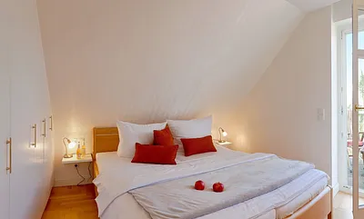 Schlafzimmer mit Doppelbett