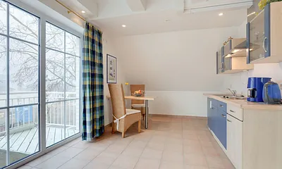 Wohnzimmer mit Küche