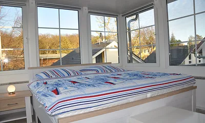 Wintergarten (Schlafzimmer 3) mit Doppelbett