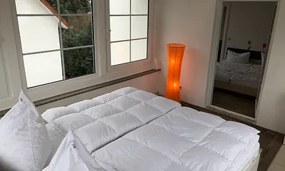 Wintergarten mit Durchgang zu Schlafzimmer 1