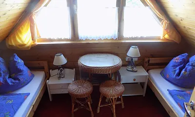 Der zweite Schlafraum mit zwei Einzelbetten