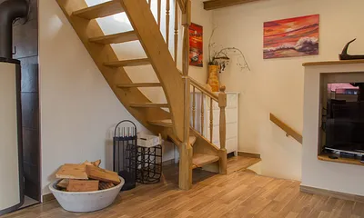 Treppe zum Schlafbereich im Dachgeschoss