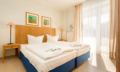 Vom Schlafzimmer aus ist der schöne Südbalkon zu betreten. 