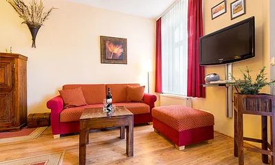 Auf der Couch kann bei Bedarf für 1 Person aufgebettet werden.