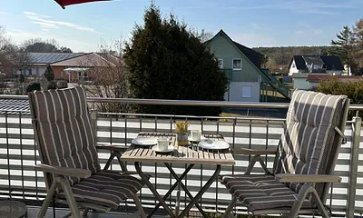 KAFFEEKRÄNZCHEN UNTERM SONNENSCHIRM