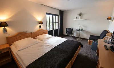 Doppelzimmer mit Balkon zum See 