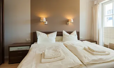 Sanfte Farben und Gemütlichkeit im Schlafzimmer