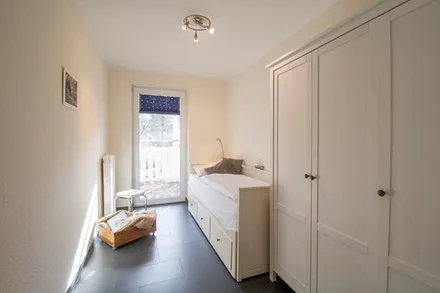 Schlafzimmer mit Tandembett (zum Ausziehen)