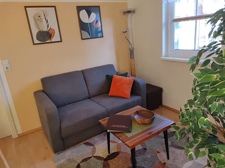 Sitzecke mit Schlafcouch