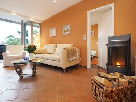 Wohnzimmer mit Kamin