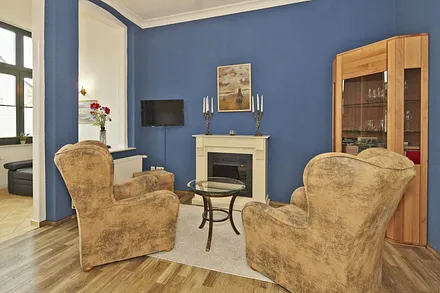 Wohnzimmer mit Elektrokamin