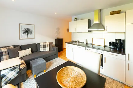 Wohnzimmer mit Küche