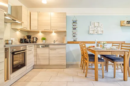 Die Wohnung bietet eine Küche mit allen nötigen Utensilien.