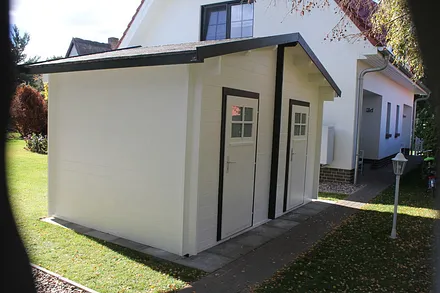 Abstellraum für Bollerwagen und Fahrräder