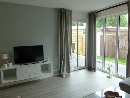 Wohnraum mit Küche Wohnung 1