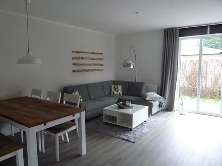 Wohnzimmer und Essplatz Wohnung 2 