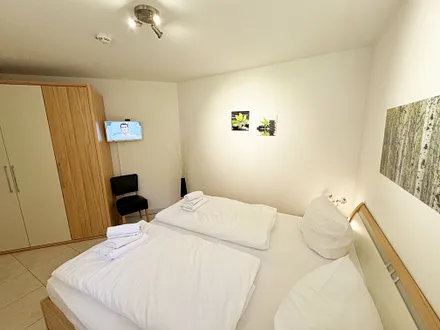Schlafzimmer mit TV