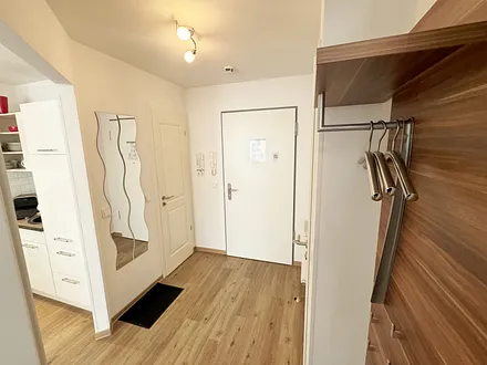 Wohnung  Ostseesilber - vom Flur aus Blick in die Küche