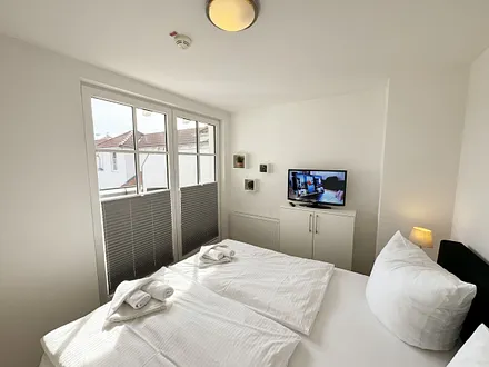 Schlafzimmer mit TV