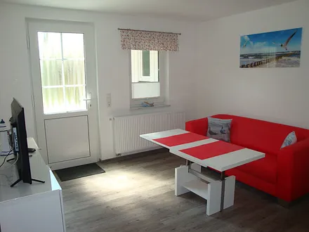 Der Wohn- und Essbereich mit Terrassenzugang