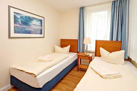 Schlafzimmer mit Einzelbetten