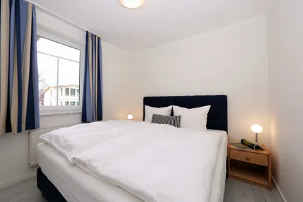 Schlafzimmer mit Doppelbett